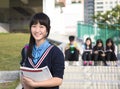 Girl Teenage StudentsÃÂ standing at campus Royalty Free Stock Photo